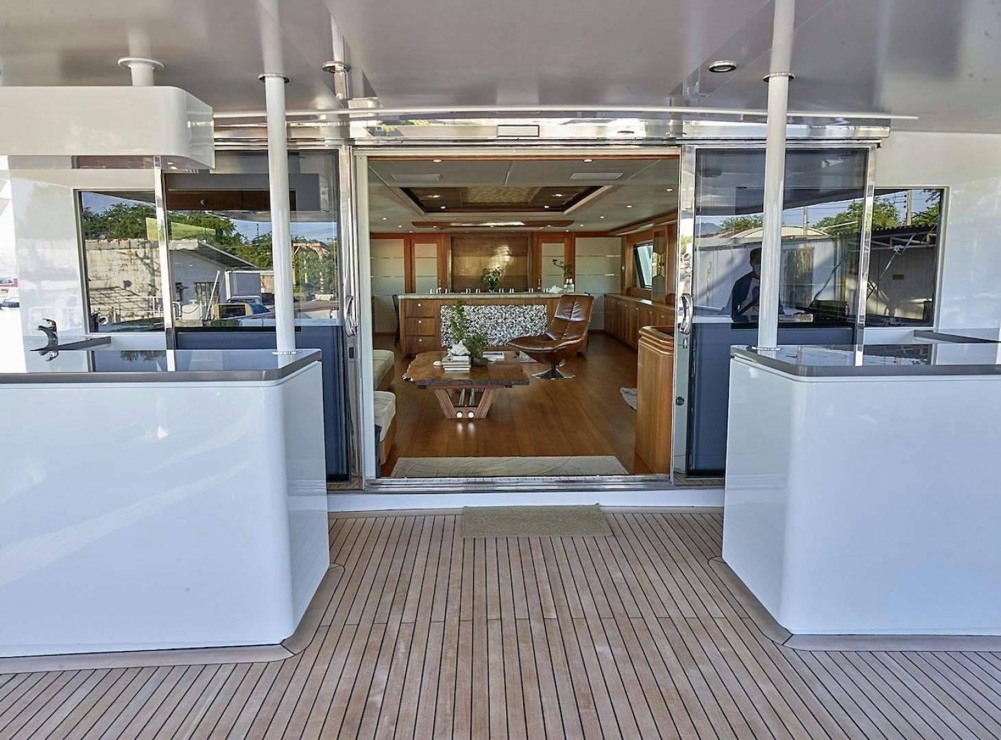 a room with a table and chairs aboard ALAIA Yacht for Sale