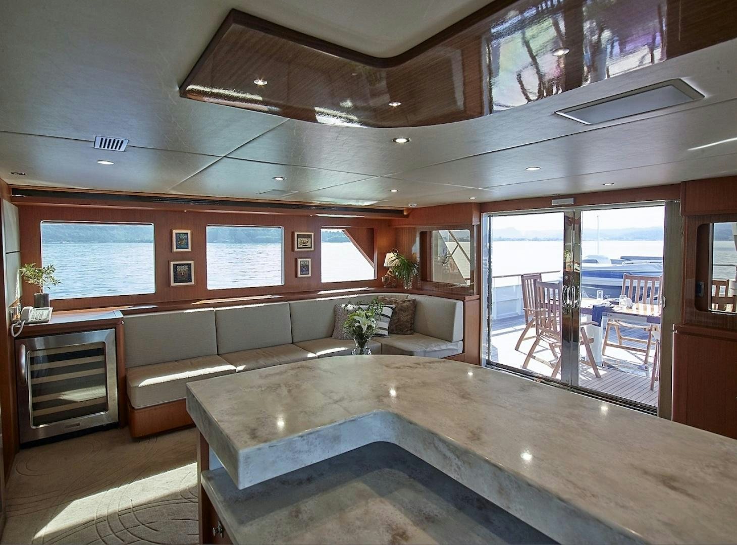 a large kitchen with a large island aboard ALAIA Yacht for Sale