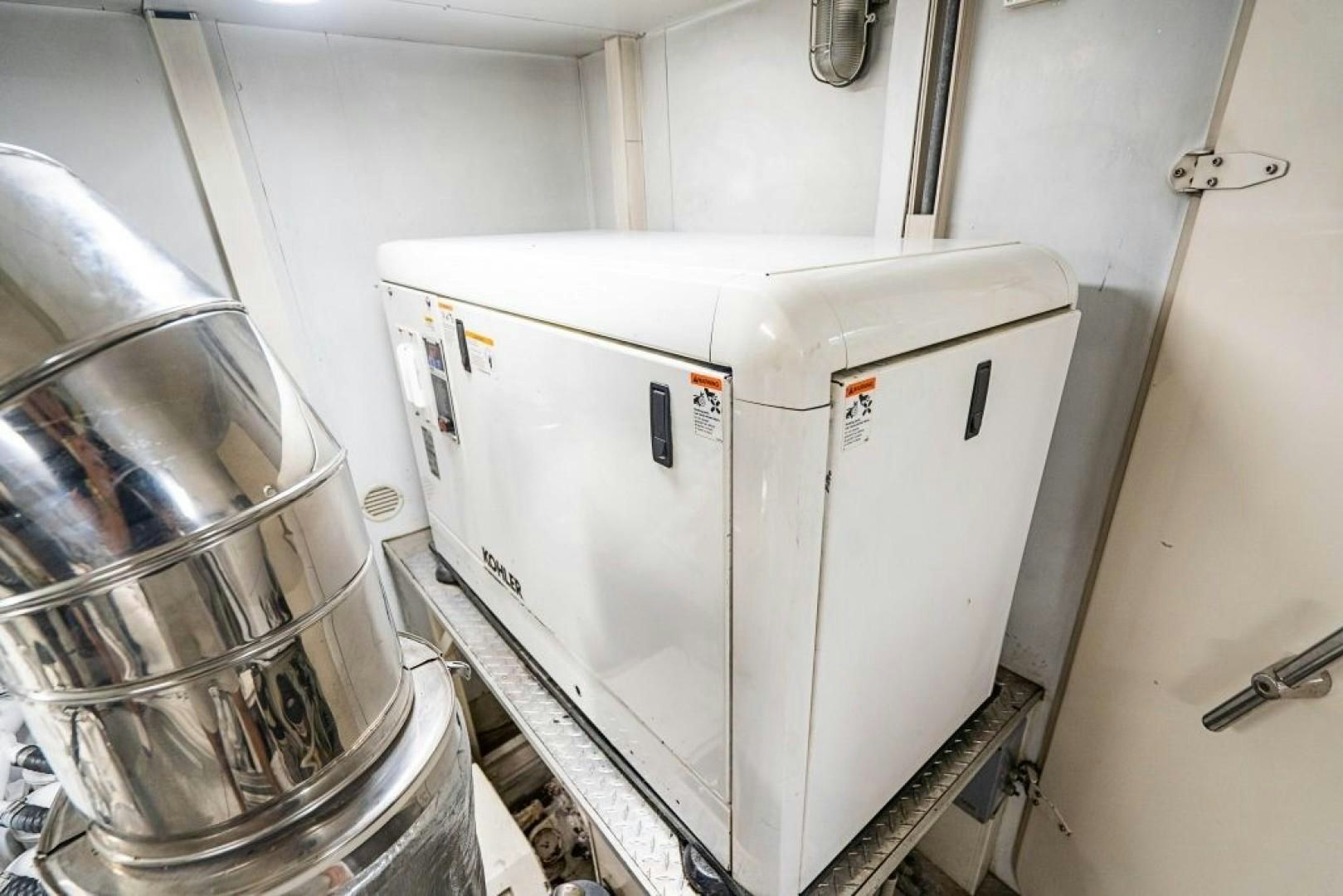 a machine in a room aboard CINQUE MARE Yacht for Sale