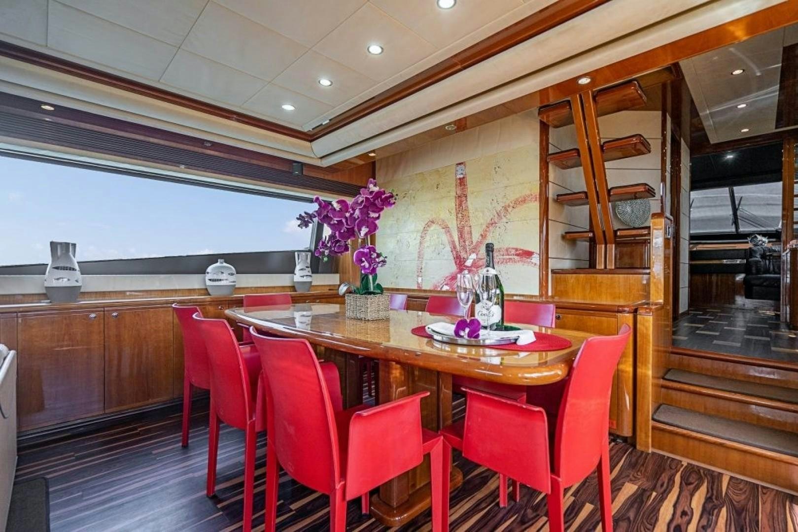 a dining table in a restaurant aboard CINQUE MARE Yacht for Sale