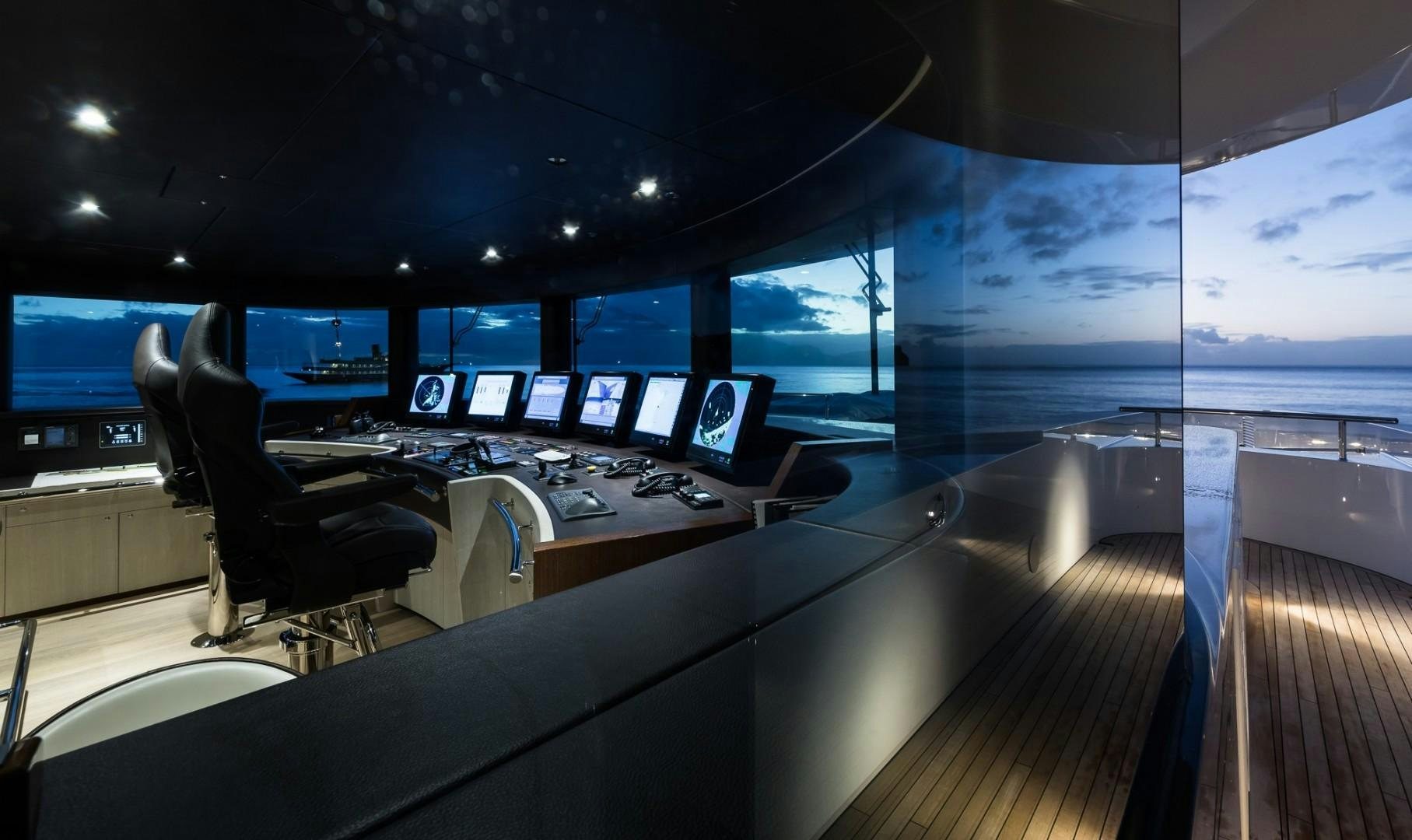 a room with many computer screens aboard LAURENTIA Yacht for Sale