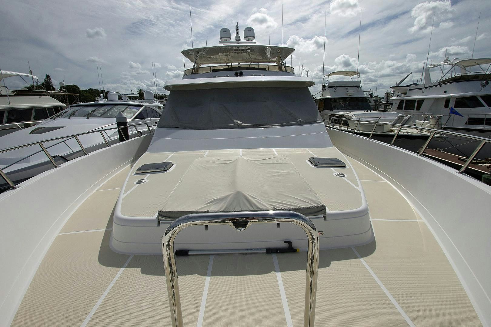 a row of yachts in a marina aboard LET IT BEE Yacht for Sale