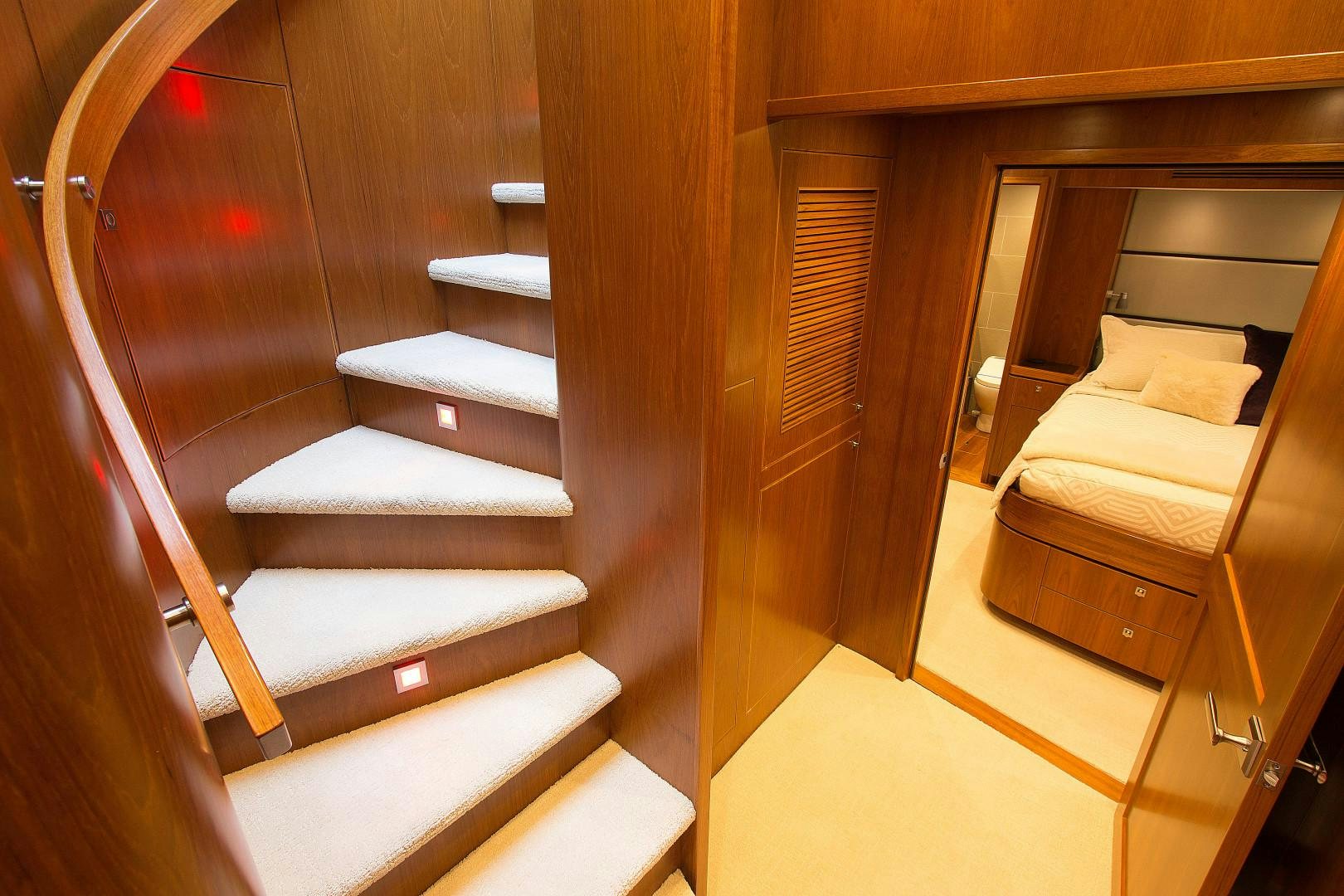 a set of stairs in a room aboard LET IT BEE Yacht for Sale