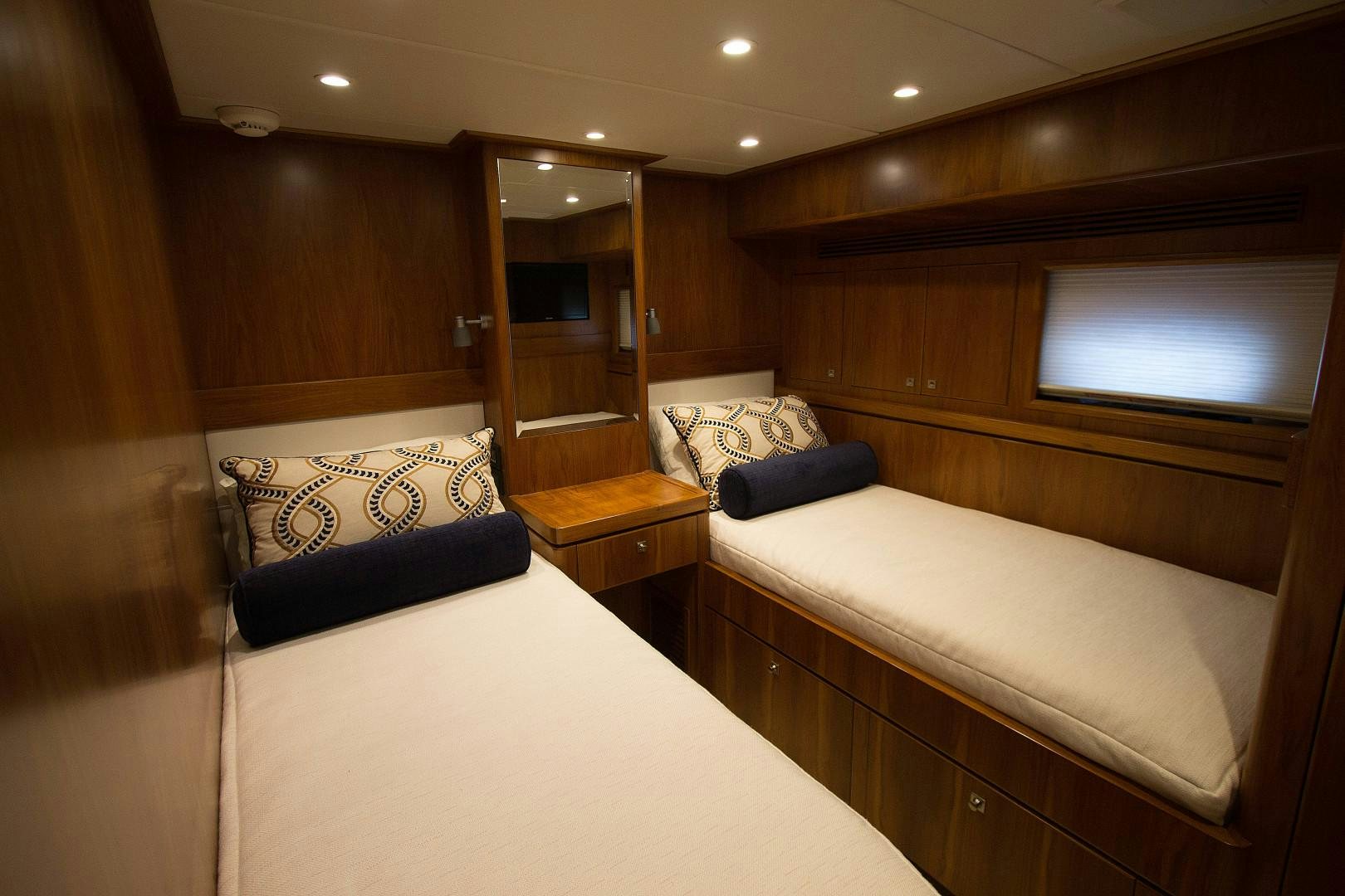 a room with two beds aboard LET IT BEE Yacht for Sale