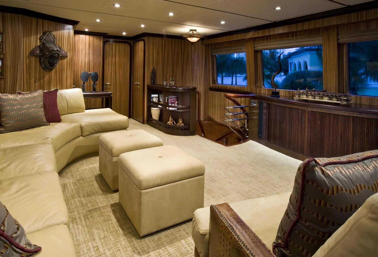 a living room with a fireplace aboard SANDRINE Yacht for Sale