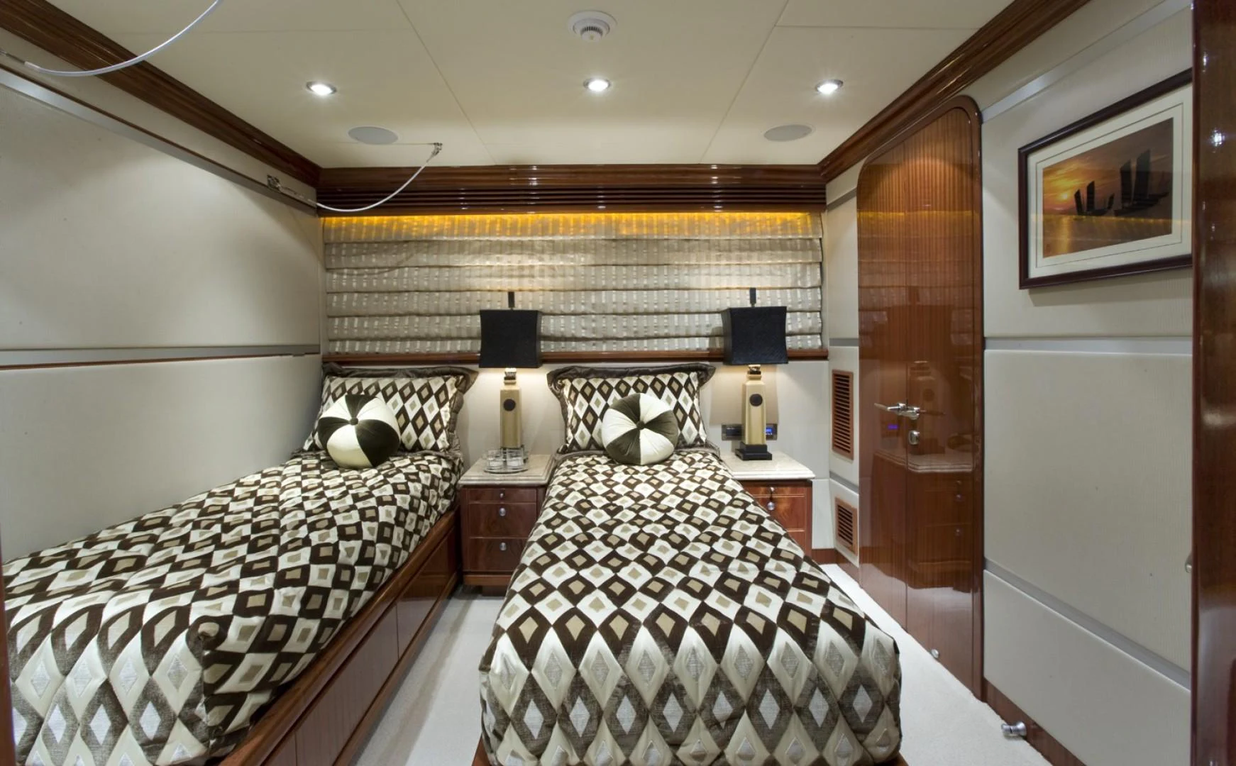 a couple of beds in a room aboard SANDRINE Yacht for Sale