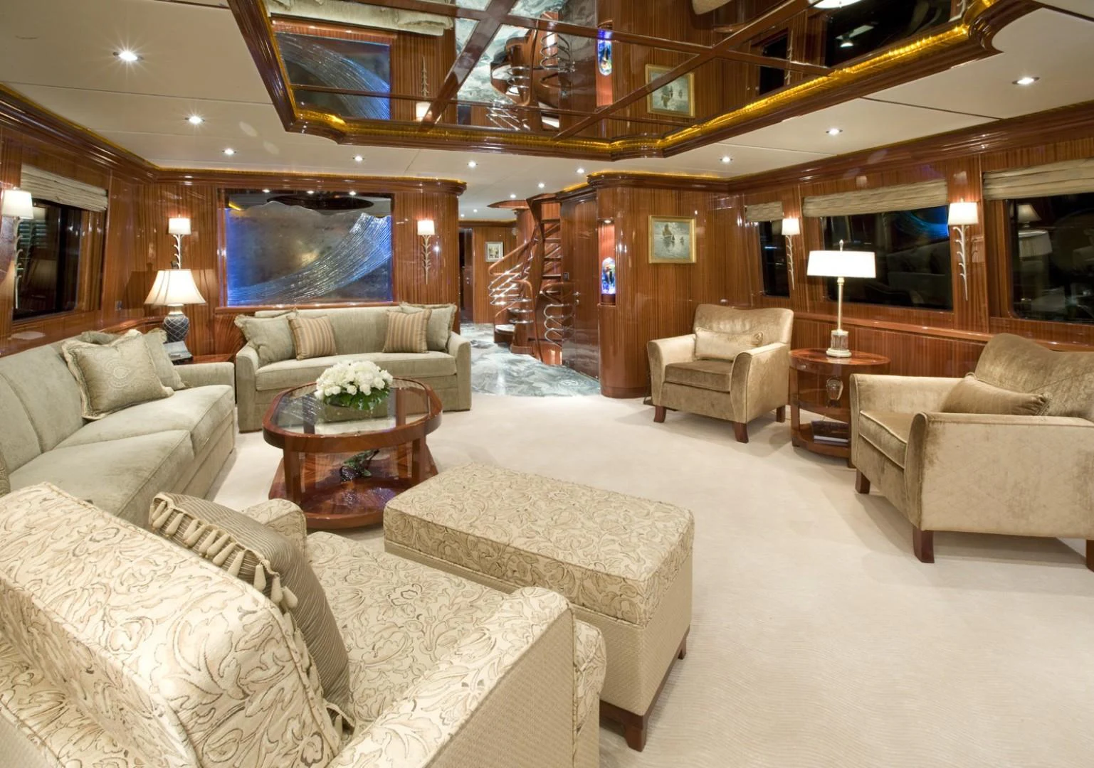 a living room with a staircase aboard SANDRINE Yacht for Sale