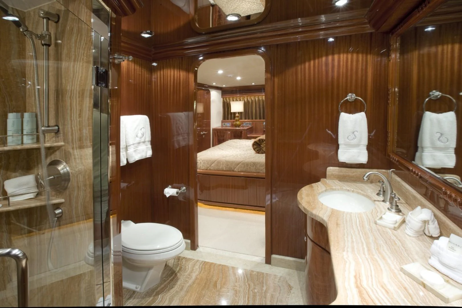 a bathroom with a sink and a toilet aboard SANDRINE Yacht for Sale