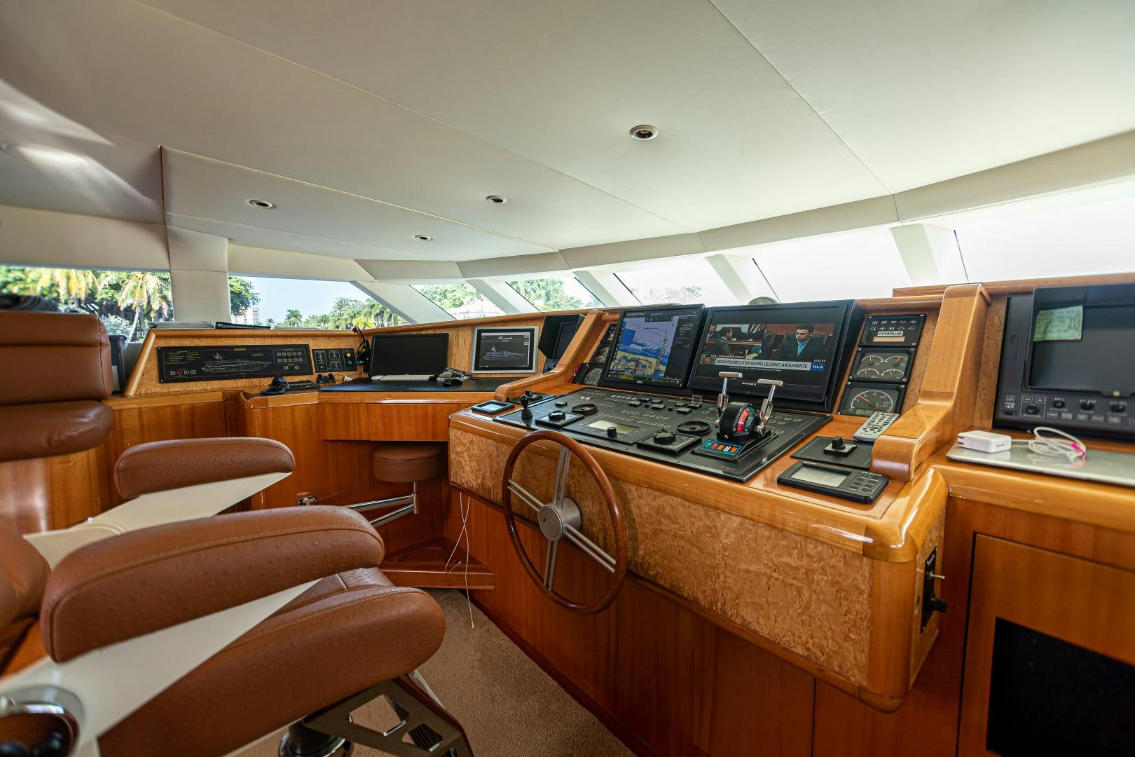 a room with computers and monitors aboard XOXO Yacht for Sale