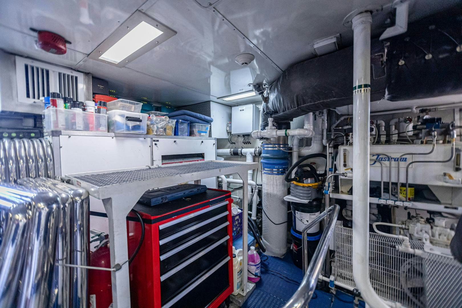 a room with machinery aboard XOXO Yacht for Sale
