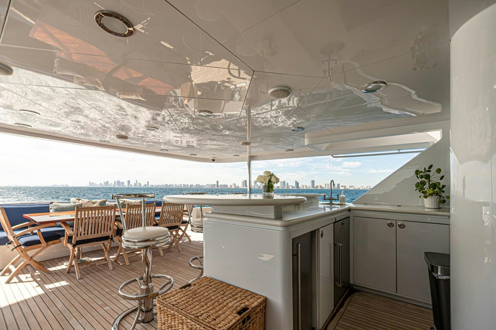 a kitchen with a large island aboard XOXO Yacht for Sale