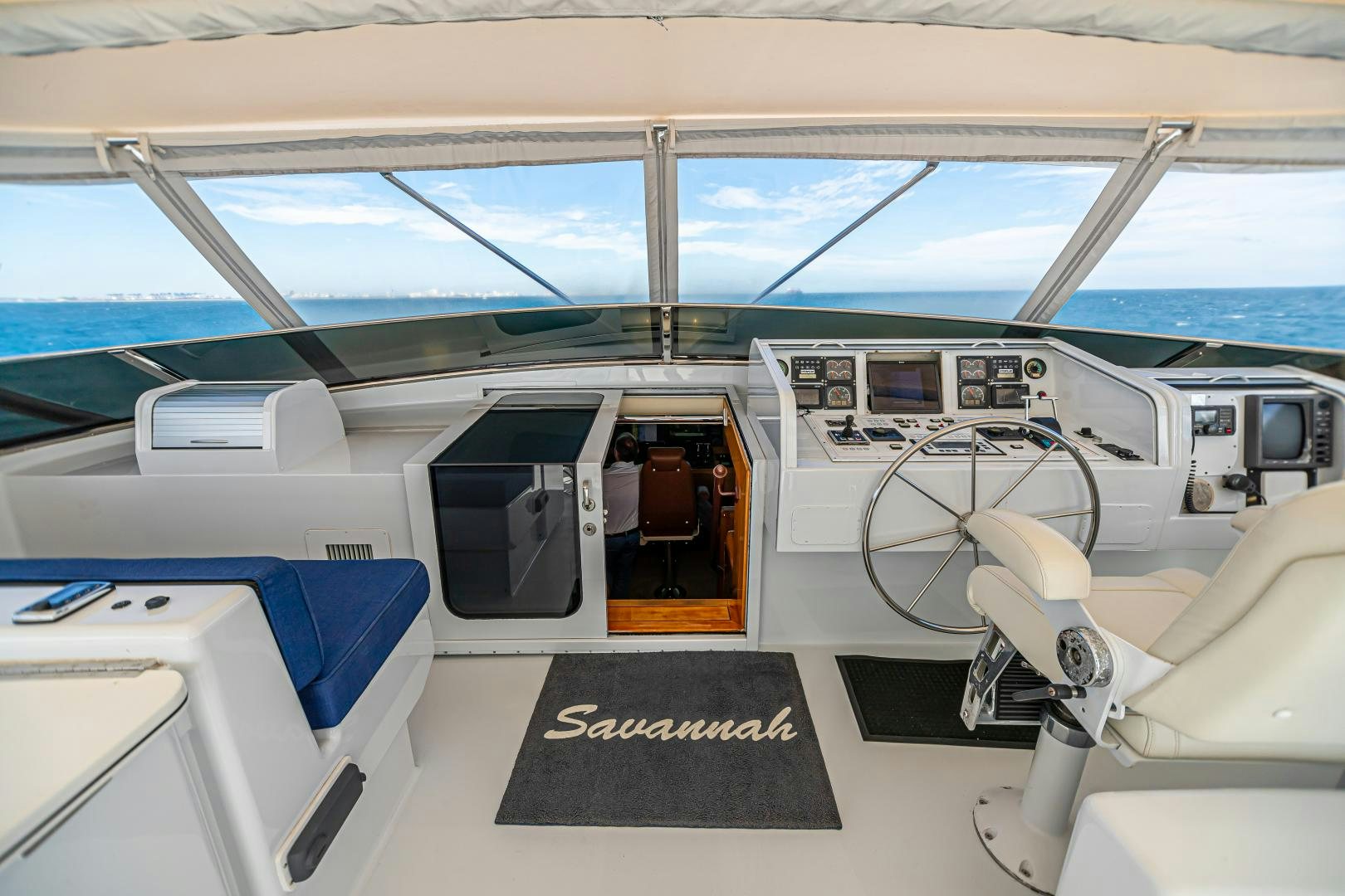 inside of a car aboard XOXO Yacht for Sale