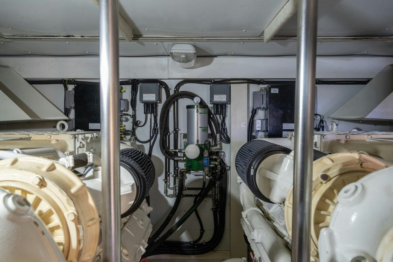 a room with several large pipes aboard SYLVIA VI Yacht for Sale