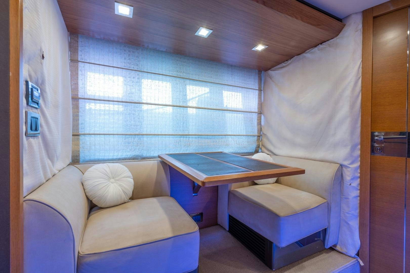 a room with a couch and a table aboard SYLVIA VI Yacht for Sale