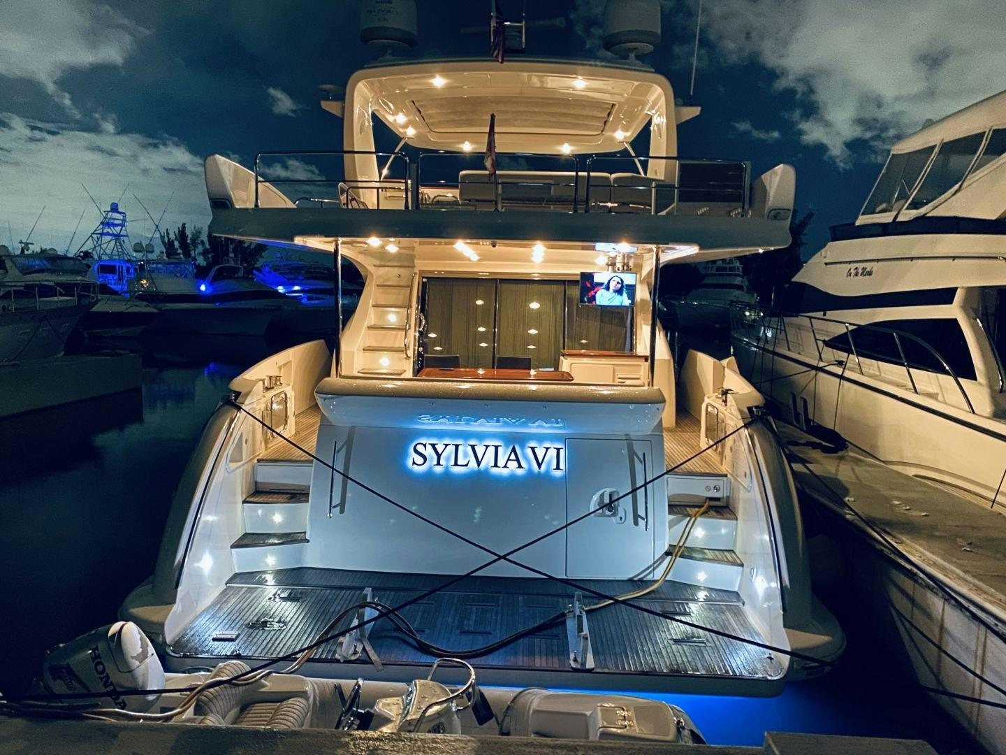 a boat with a large boat on it aboard SYLVIA VI Yacht for Sale