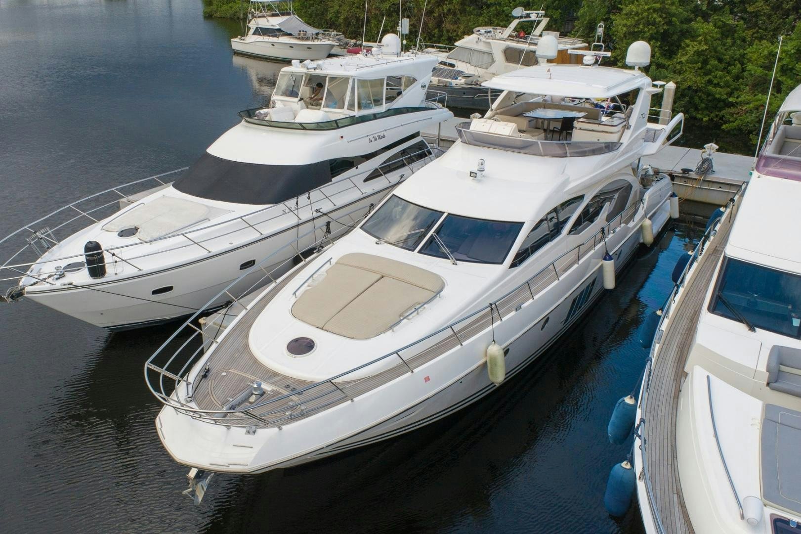 a group of boats are parked in a harbor aboard SYLVIA VI Yacht for Sale