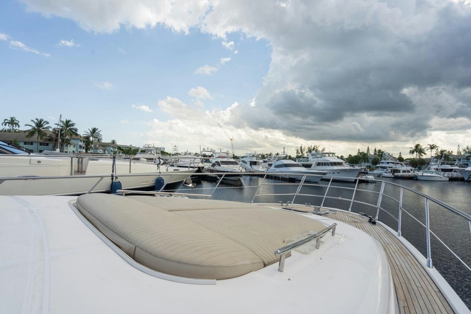 a large white pool with boats in it aboard SYLVIA VI Yacht for Sale