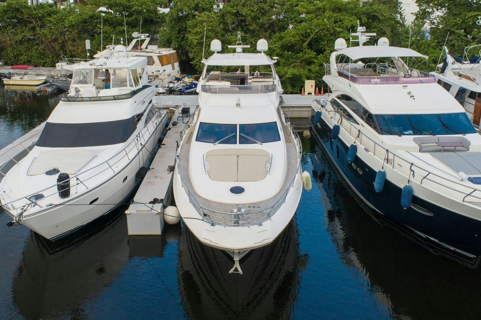 a group of boats are parked in a harbor aboard SYLVIA VI Yacht for Sale