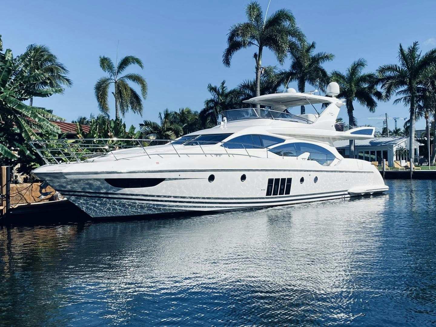 a white yacht in the water aboard SYLVIA VI Yacht for Sale