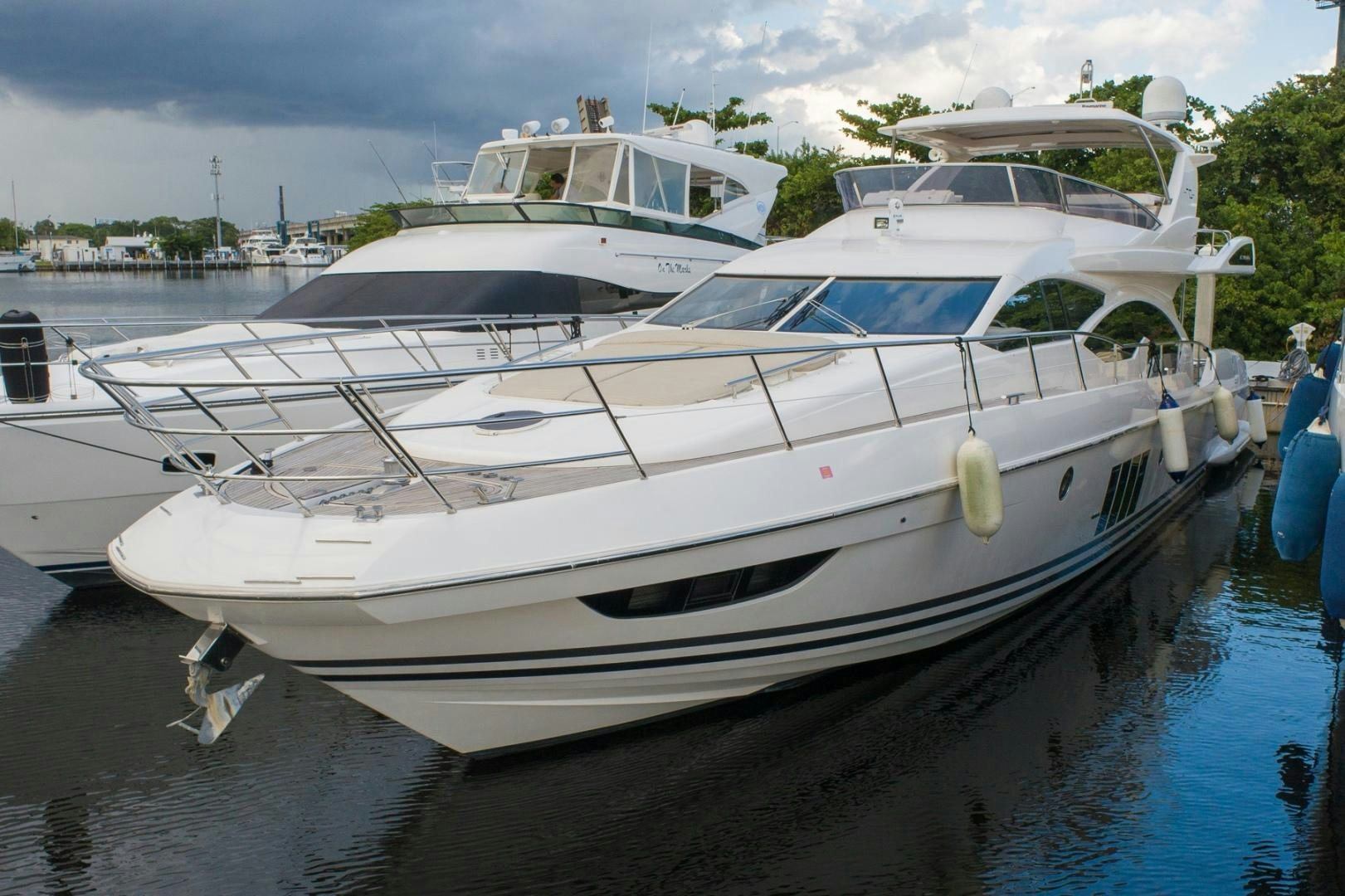 a group of boats are parked in a harbor aboard SYLVIA VI Yacht for Sale
