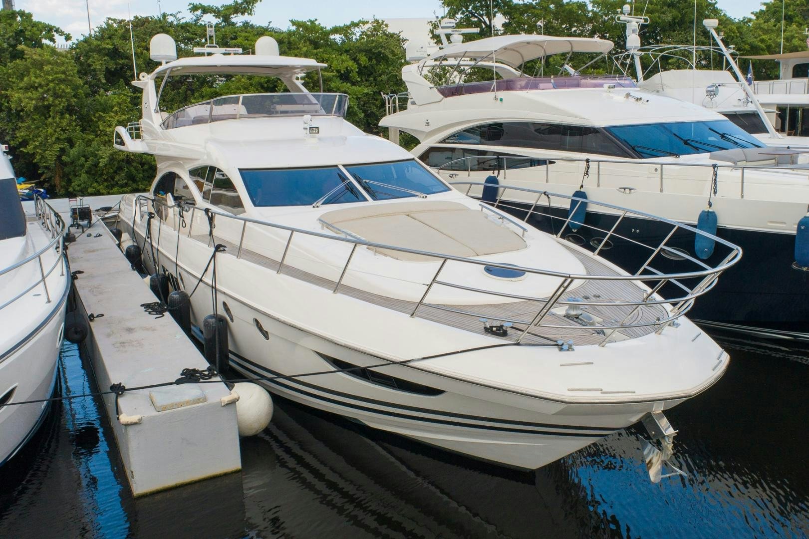 a group of boats are parked in a harbor aboard SYLVIA VI Yacht for Sale