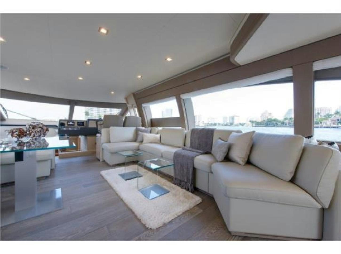 a living room with a large window aboard BLUE ABALONE Yacht for Sale