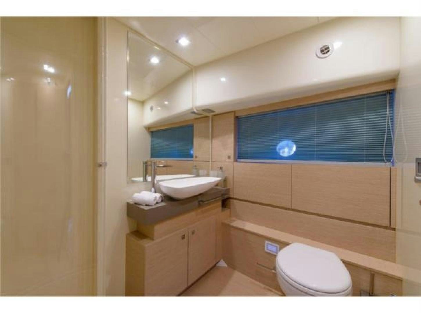 a bathroom with a sink and a toilet aboard BLUE ABALONE Yacht for Sale