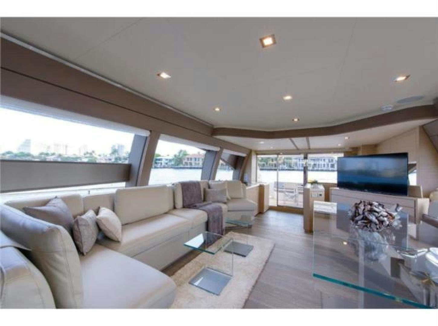 a living room with a large window aboard BLUE ABALONE Yacht for Sale