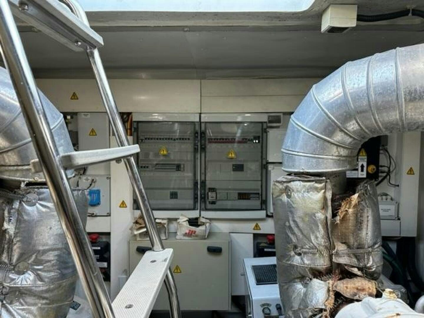 a room with machines and equipment aboard DV8 Yacht for Sale