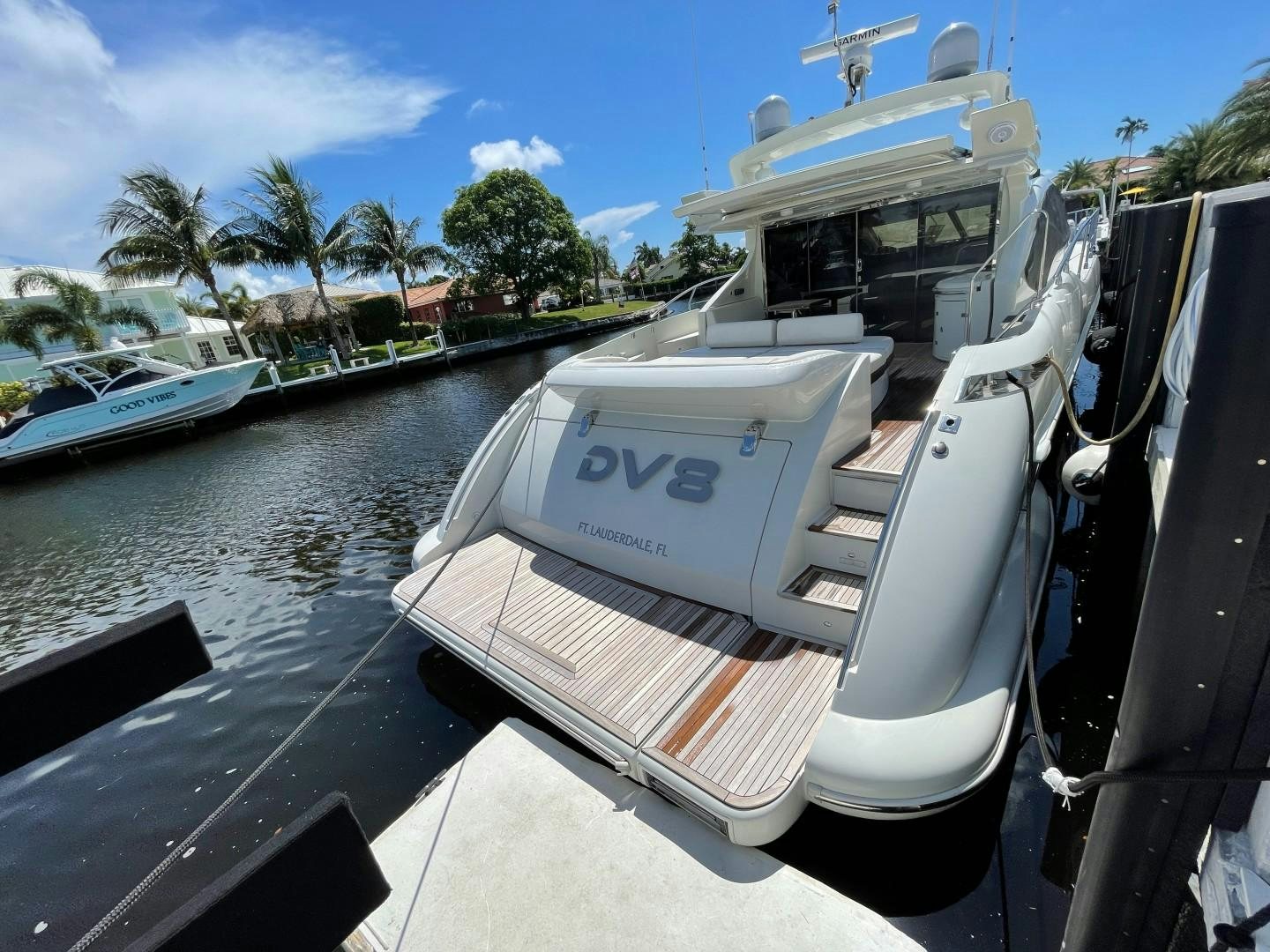 a boat docked at a pier aboard DV8 Yacht for Sale