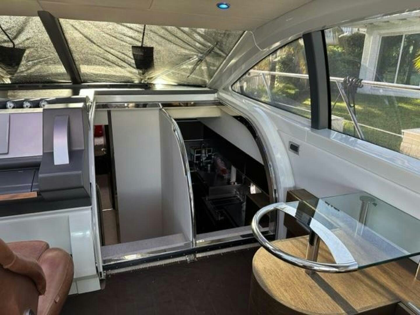 a person holding a computer aboard DV8 Yacht for Sale