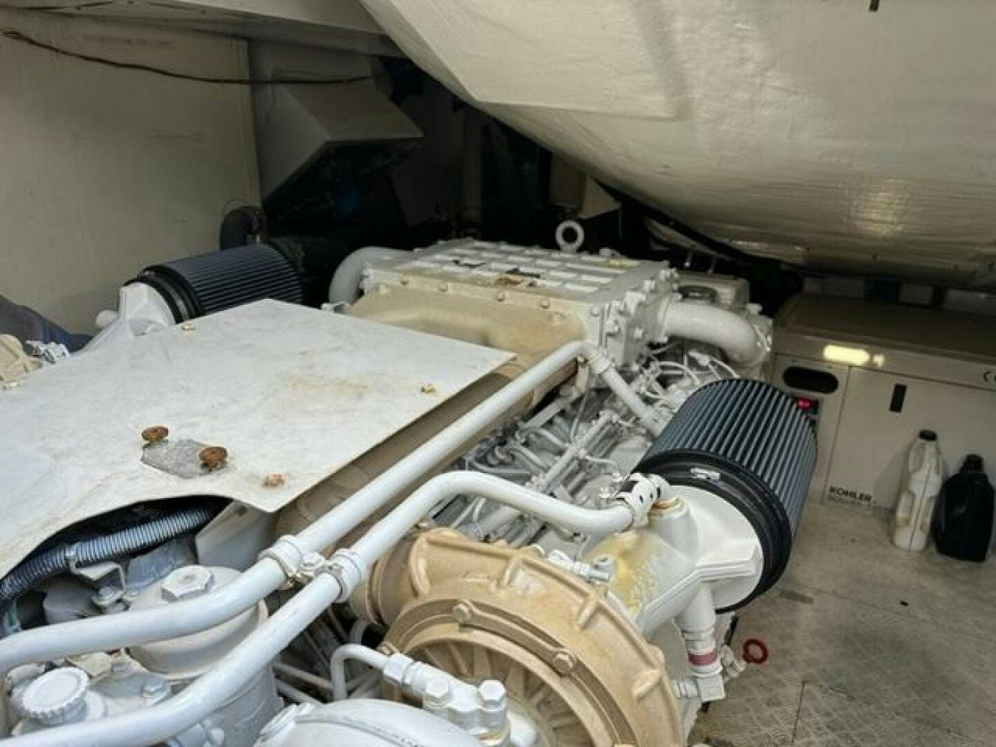 a car with a large metal object aboard DV8 Yacht for Sale