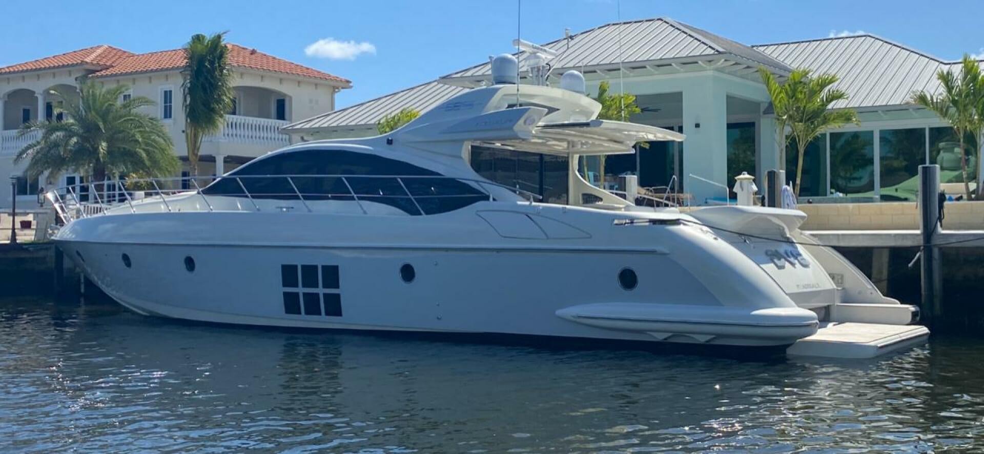 a white yacht in a body of water aboard DV8 Yacht for Sale