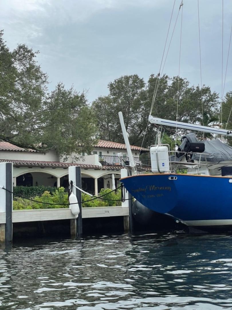 a boat docked at a pier aboard SUNDAY MORNING Yacht for Sale