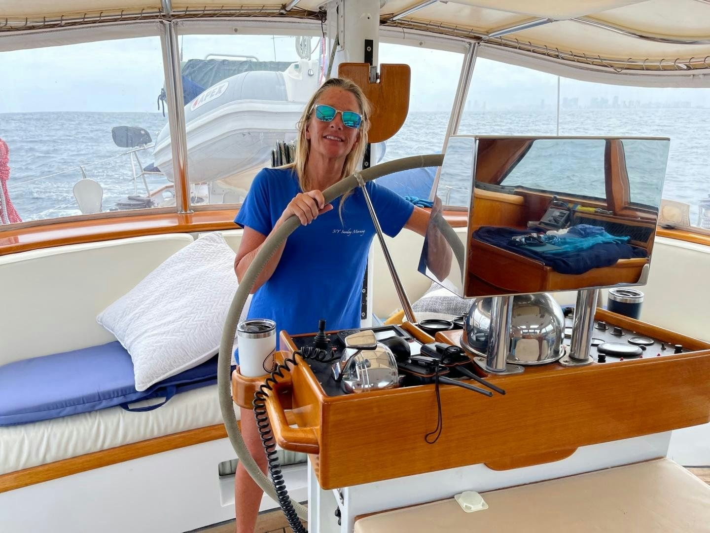 a person sitting on a boat aboard SUNDAY MORNING Yacht for Sale