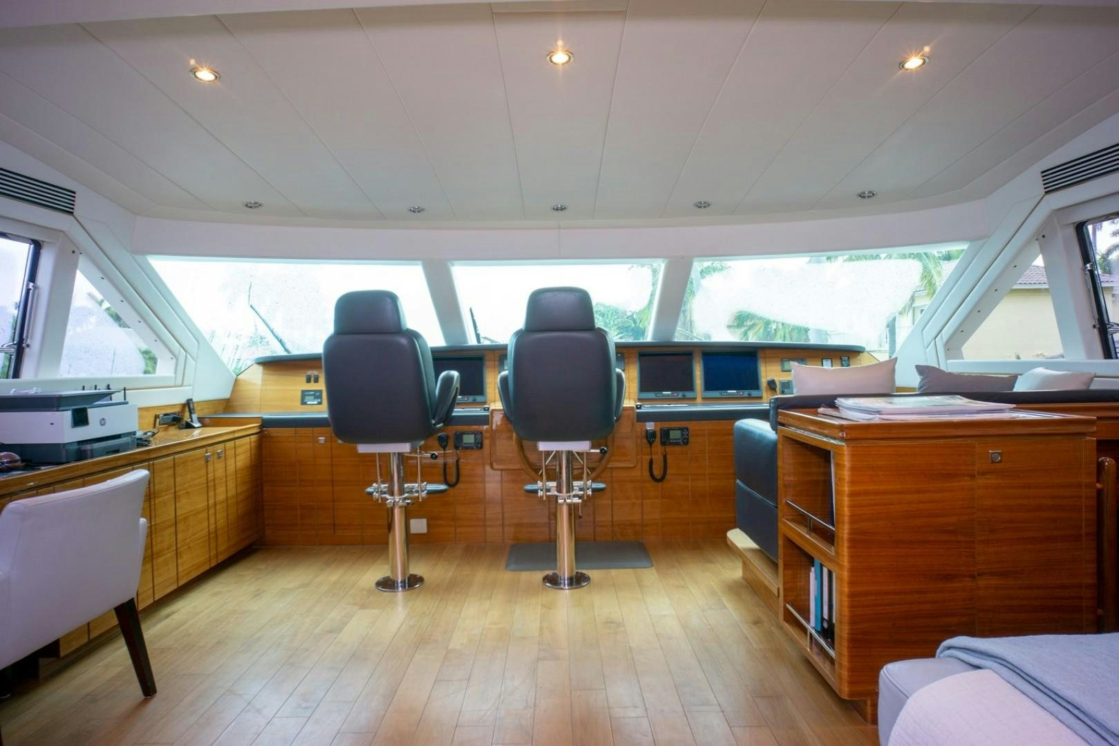 a room with a chair and a desk and a chair aboard IN THE ZONE Yacht for Sale