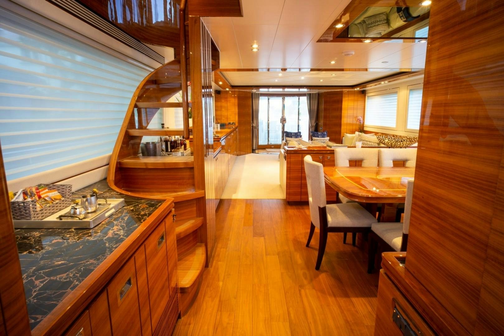 a kitchen with a wood floor aboard IN THE ZONE Yacht for Sale