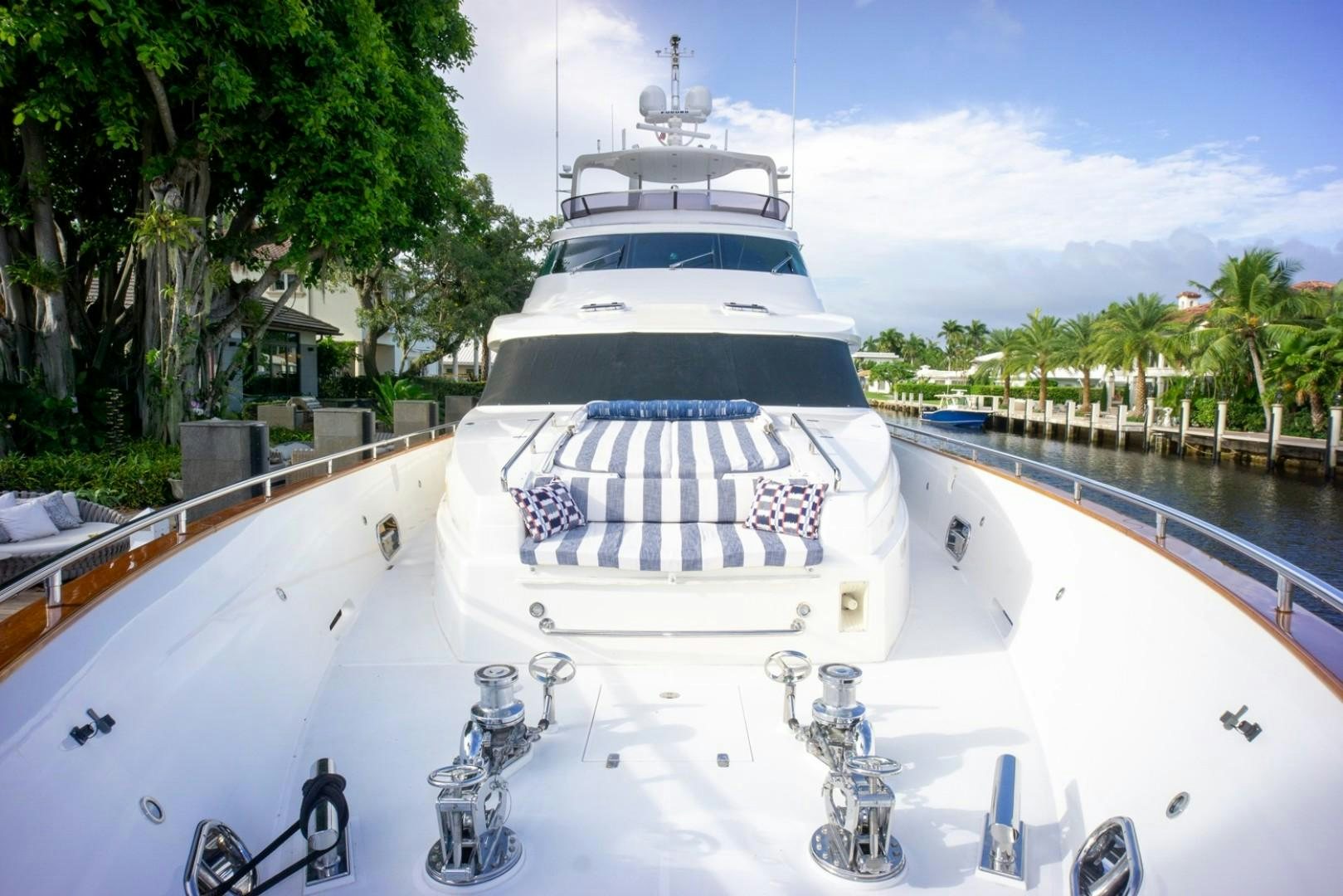 a large white boat with a logo on it aboard IN THE ZONE Yacht for Sale