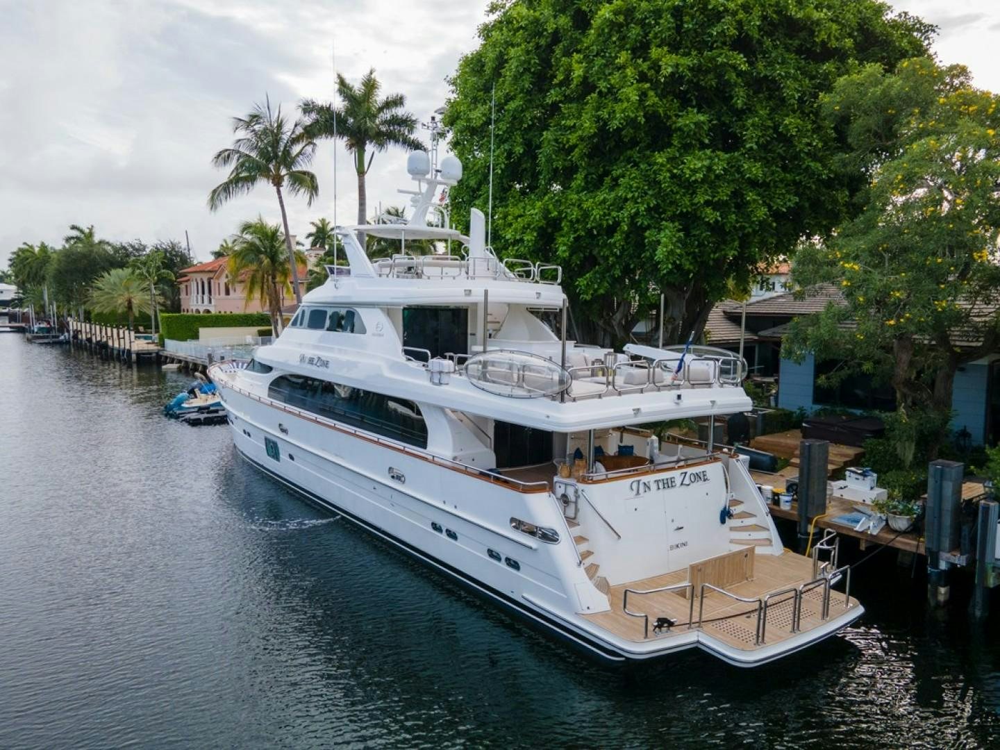 a boat docked at a pier aboard IN THE ZONE Yacht for Sale