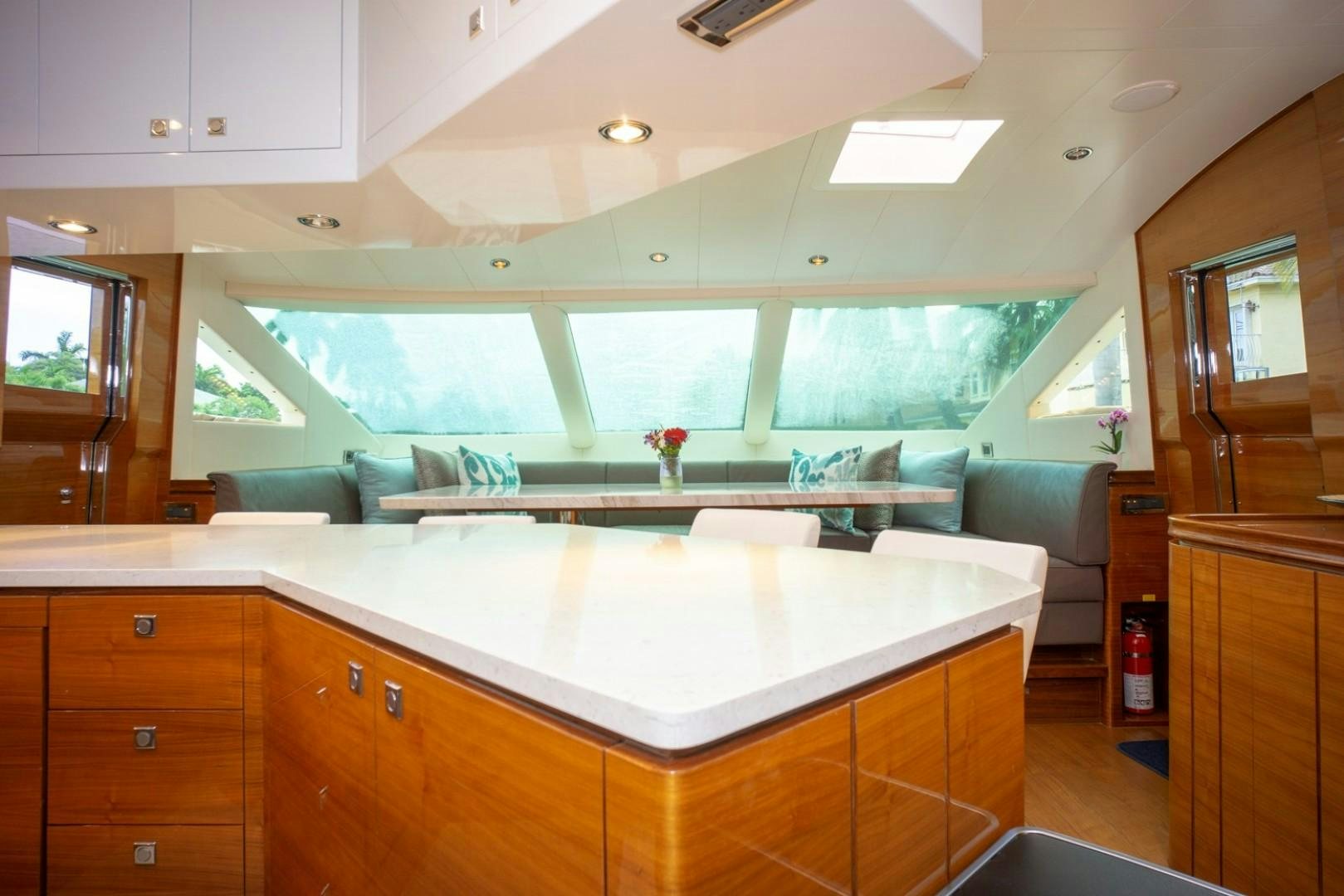 a kitchen with a large island aboard IN THE ZONE Yacht for Sale