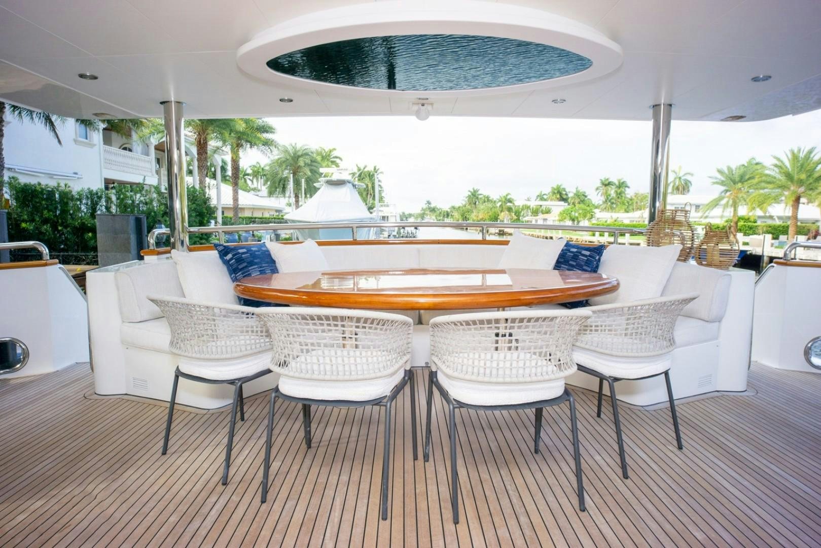 a table and chairs in a room aboard IN THE ZONE Yacht for Sale