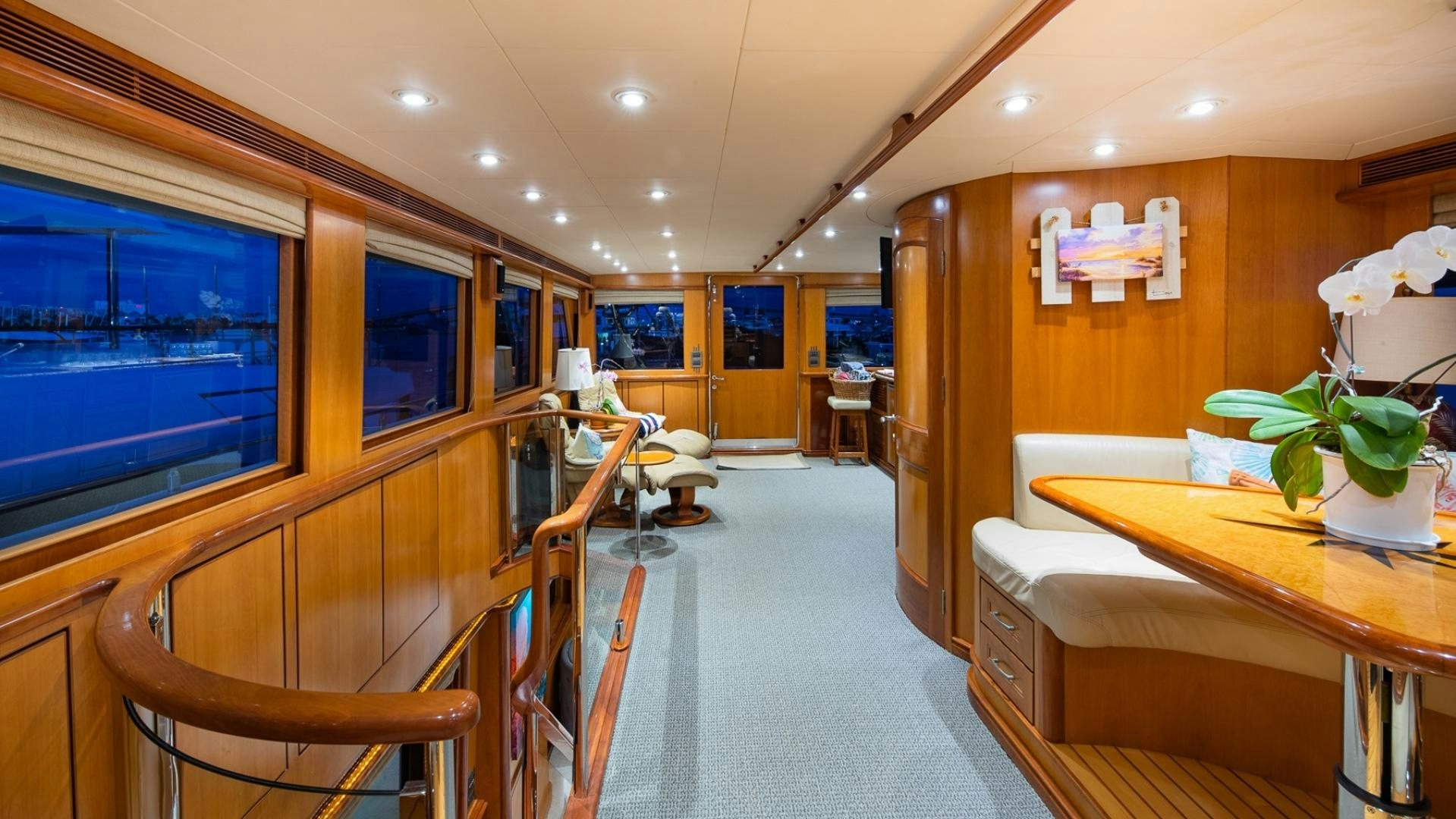 a room with a table and chairs aboard MAGICAL DAYS Yacht for Sale
