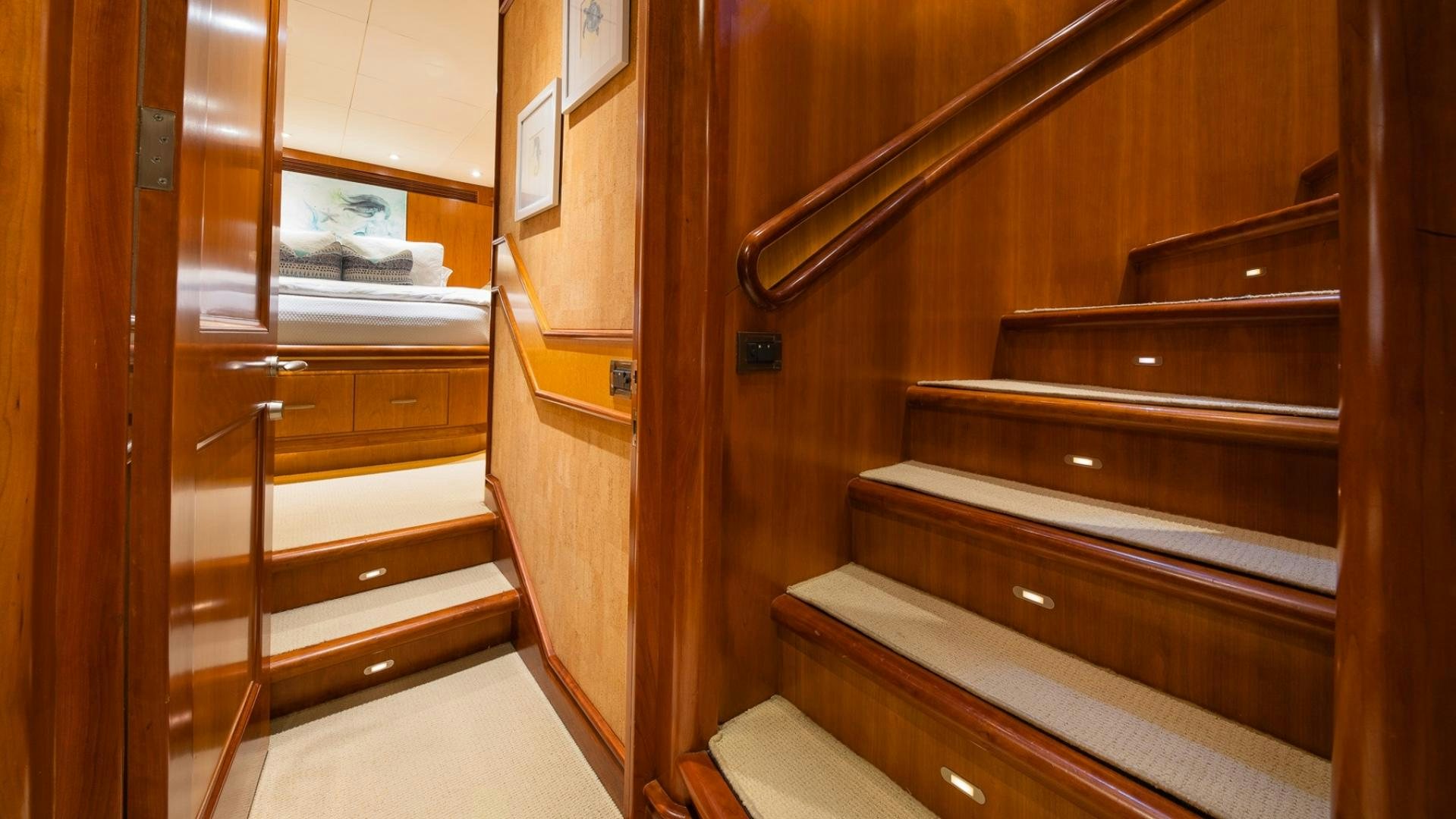 a wooden cabinet with drawers aboard MAGICAL DAYS Yacht for Sale