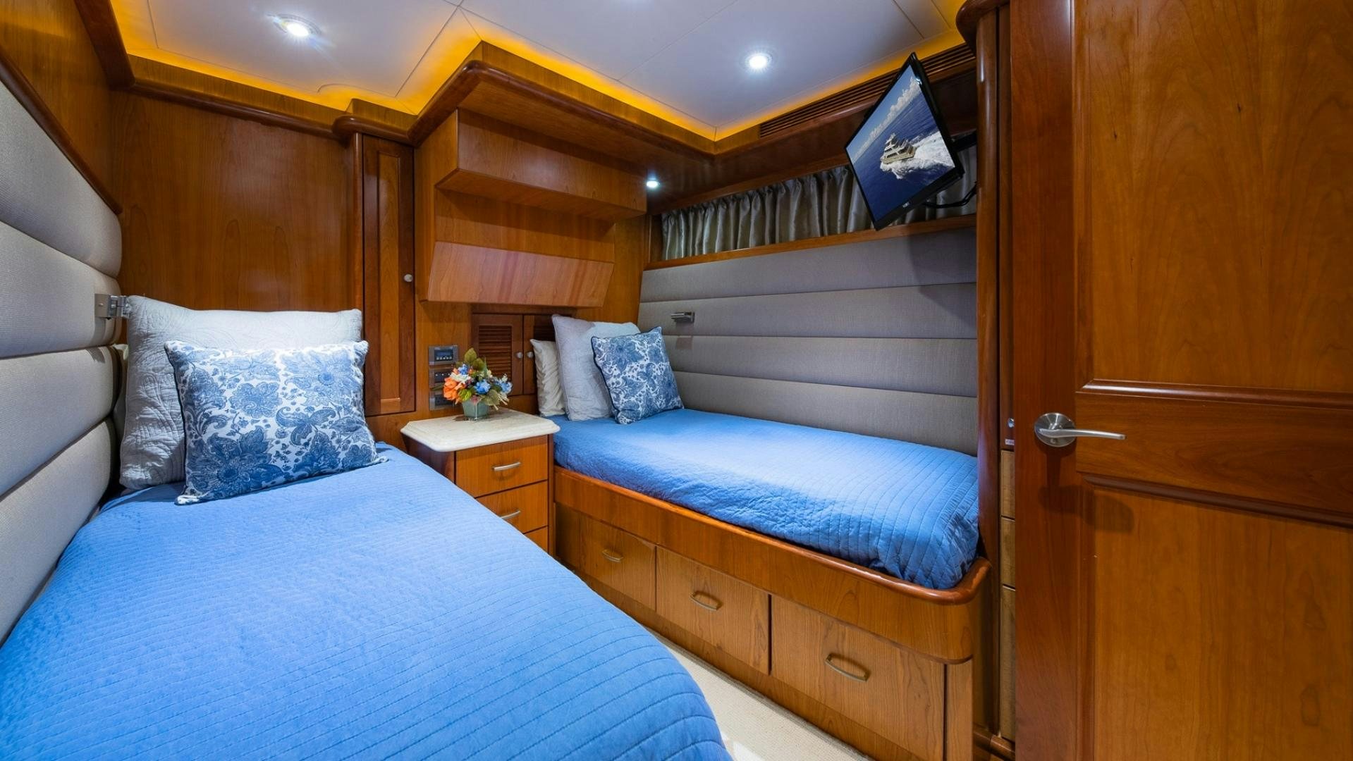 a couple of beds in a room aboard MAGICAL DAYS Yacht for Sale