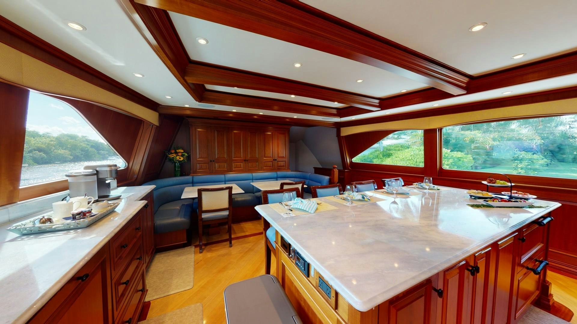 a kitchen with a large island aboard PATRIOT Yacht for Sale