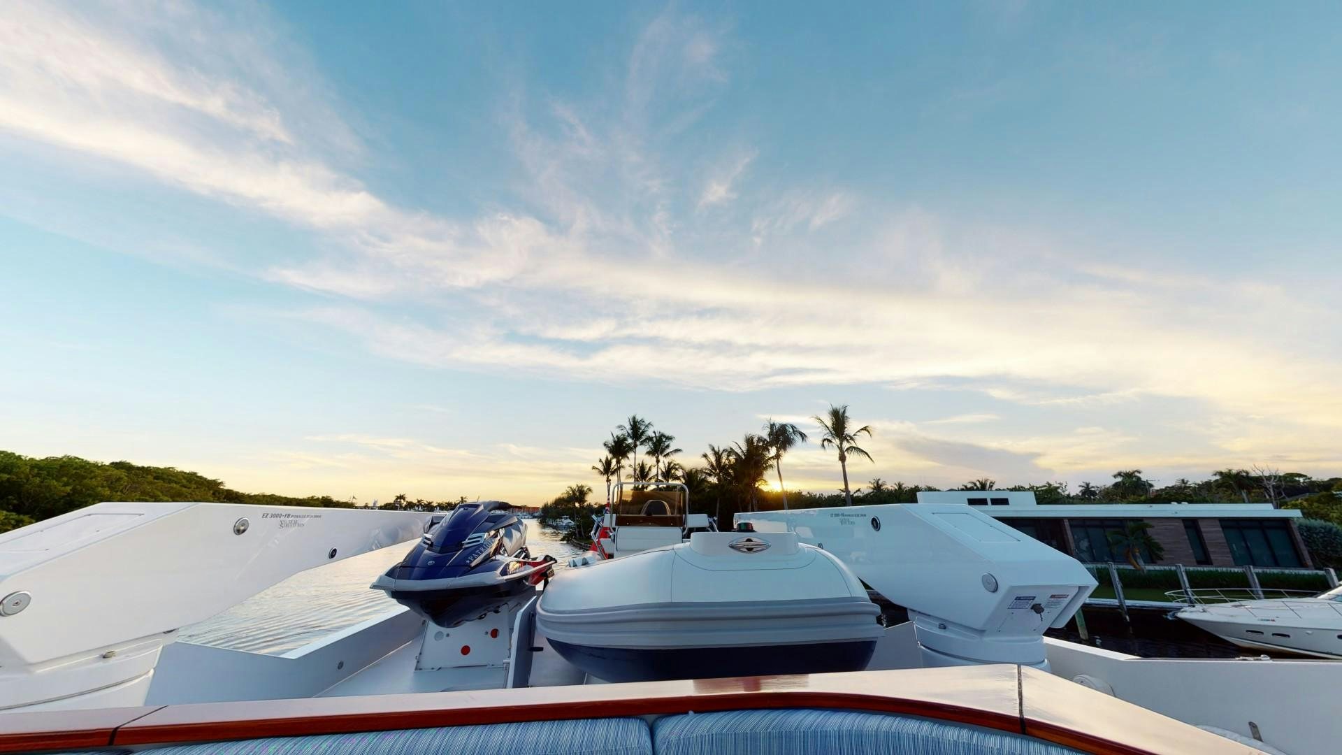 a row of boats on a dock aboard PATRIOT Yacht for Sale