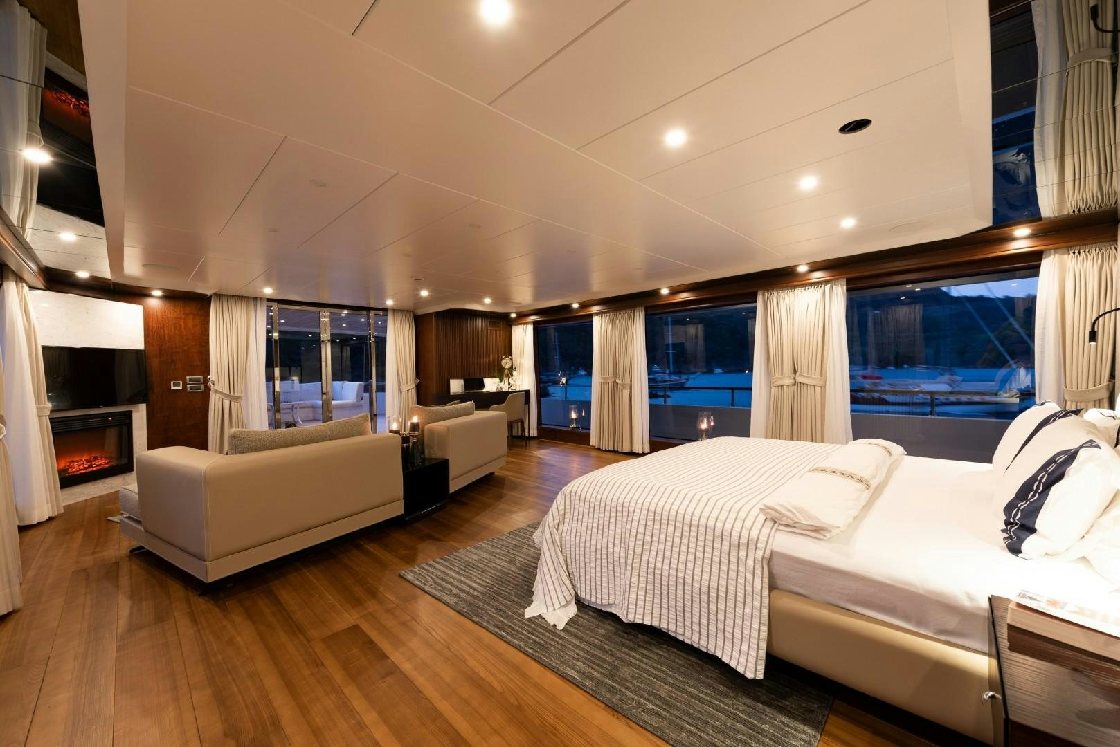 a large bedroom with a large bed aboard OCEAN BREEZE Yacht for Sale