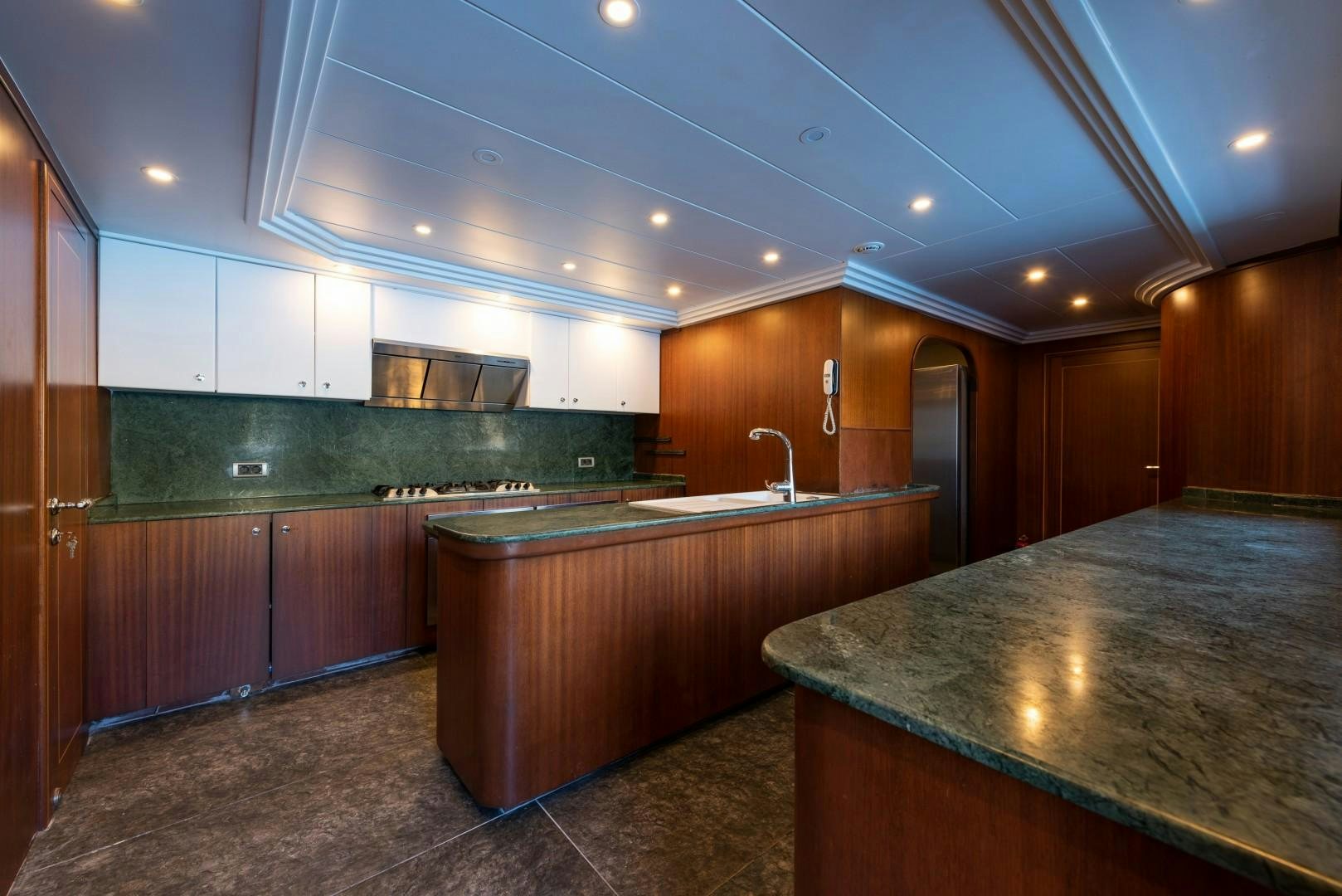 a kitchen with a countertop aboard OCEAN BREEZE Yacht for Sale