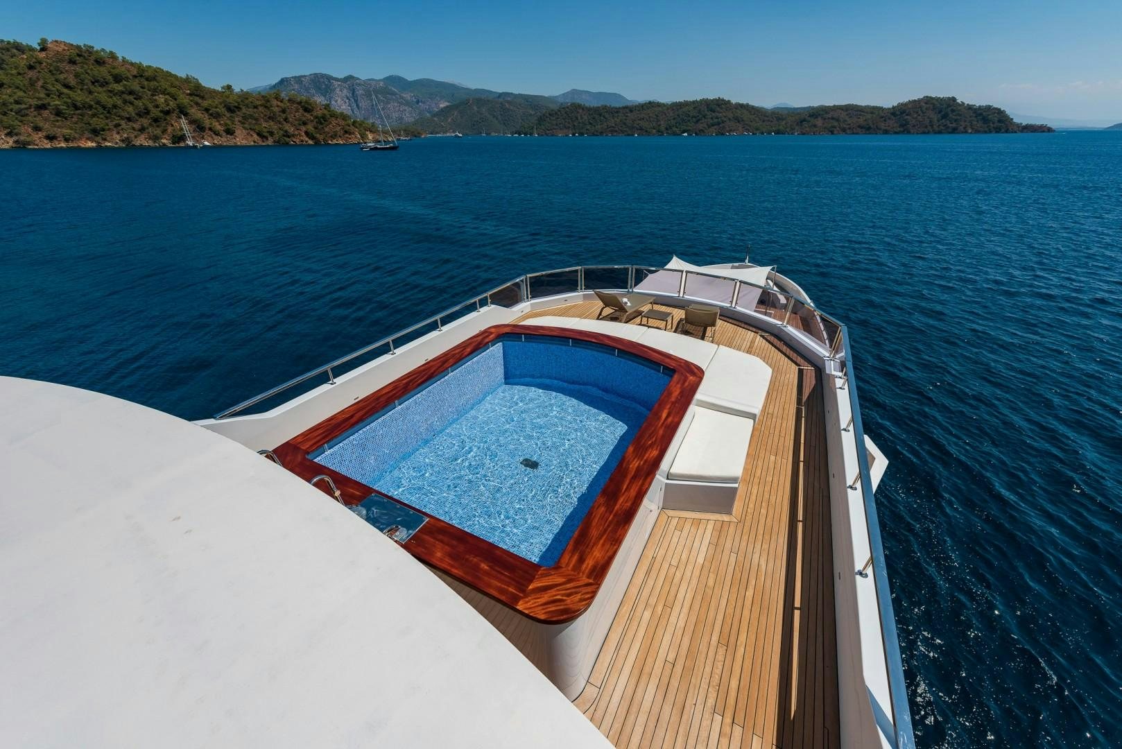 a boat on the water aboard OCEAN BREEZE Yacht for Sale