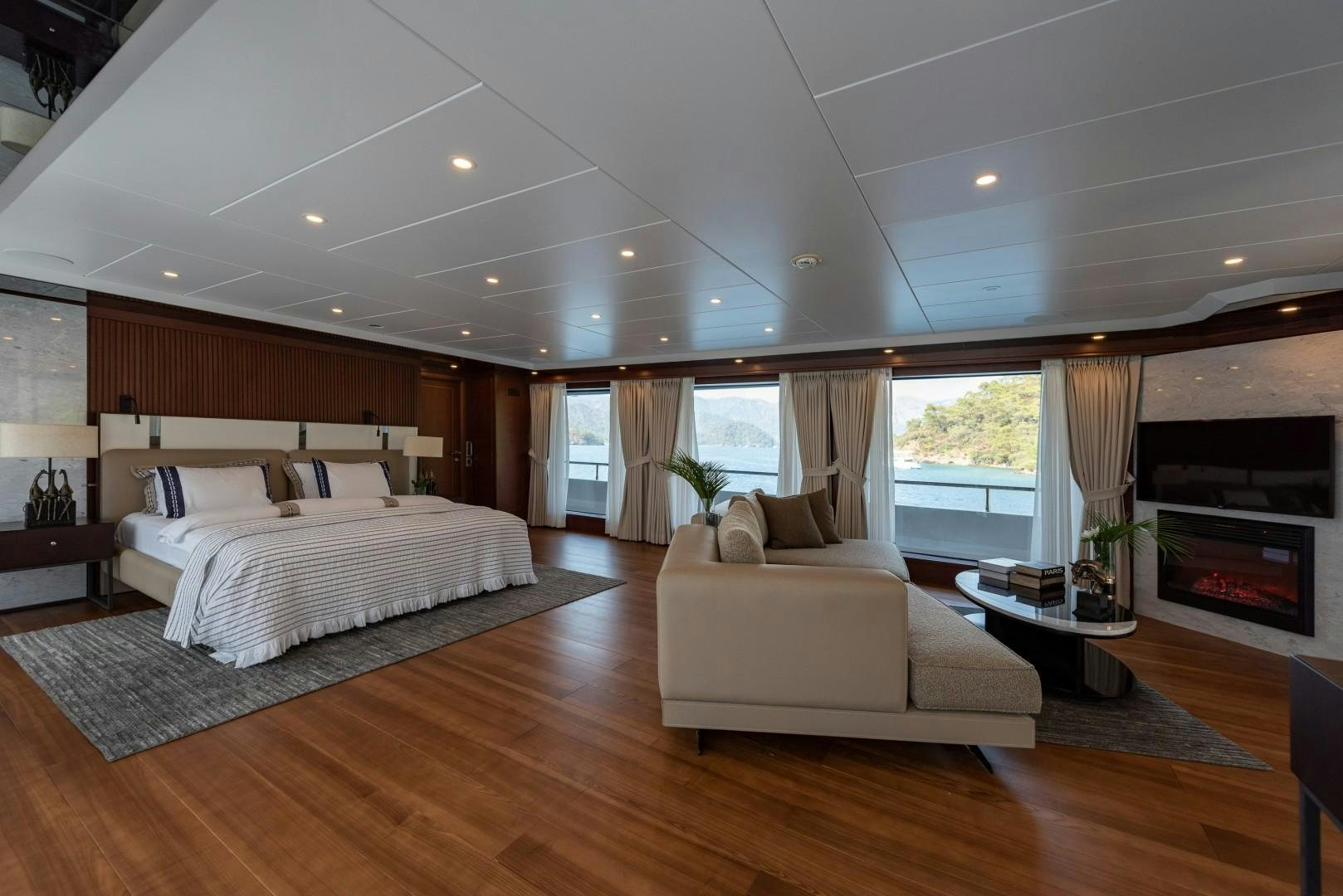 a large bedroom with a large bed aboard OCEAN BREEZE Yacht for Sale